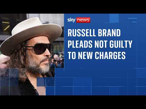 Russell Brand says he feels ‘blessed’ outside court before pleading not guilty