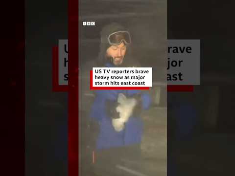 US TV reporters brave heavy snow as major storm hits east coast. #WinterStorm #US #BBCNews
