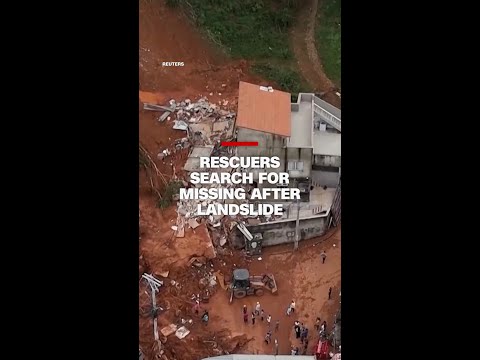 Rescuers search for missing after landslide
