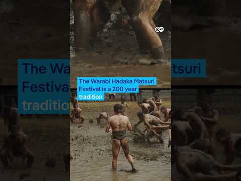 Japanese men wrestle in mud at annual festival for a good harvest | DW News