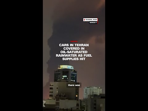 Cars in Tehran covered in oil-saturated rainwater as fuel supplies hit