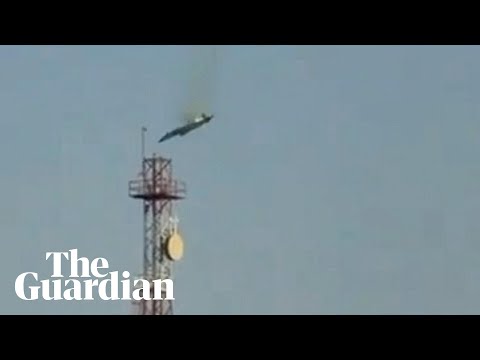 Footage shows military jet plummeting from the sky in Kuwait