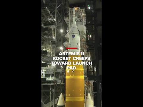 Artemis II rocket creeps toward launch pad