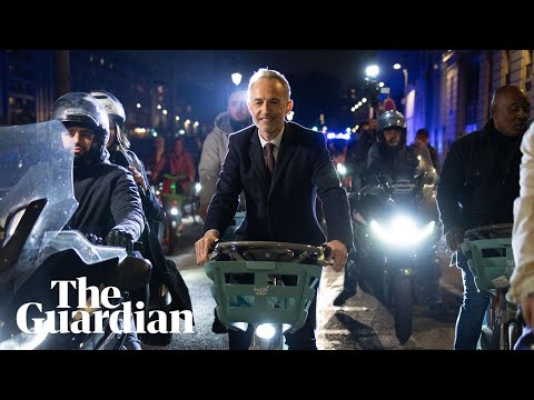 Socialist Emmanuel Grégoire arrives on bicycle after being elected mayor of Paris