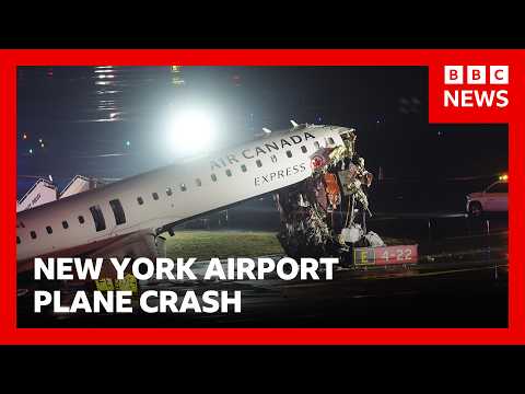 Two pilots killed after plane and ground vehicle collide at New York’s LaGuardia Airport | BBC News