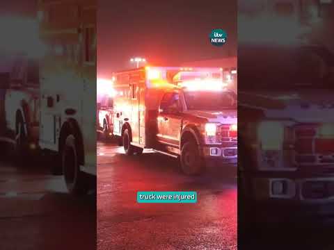 A pilot and co-pilot have died after a plane crashed into a fire engine on a runway in New York