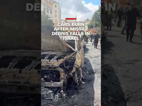 Cars burn after missile debris falls in Israel