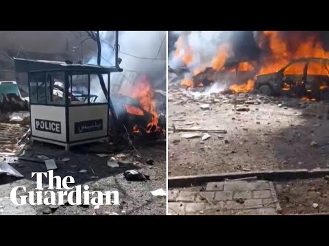 Vehicles burn in Tehran after US-Israeli strikes