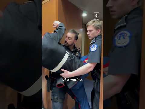 US Marine’s arm is broken during Iran war protest