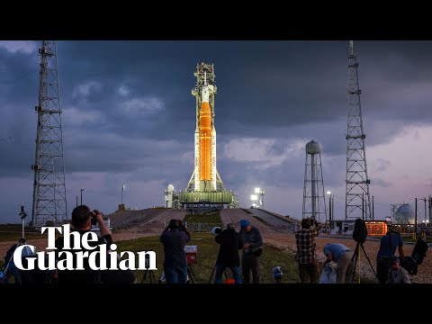 Nasa plans launch of first crewed moon mission in half century – watch live