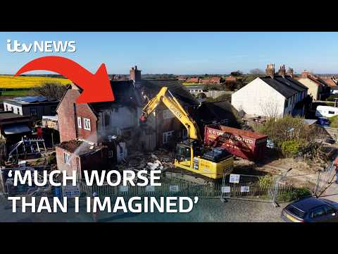 Drone pictures show houses at risk of falling into sea being demolished
