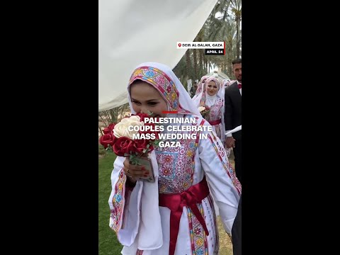 Palestinian couples celebrate mass wedding in Gaza