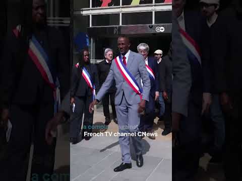 Thousands rally against racism to support Black mayor | DW News