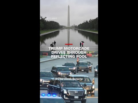 Trump motorcade drives through reflecting pool