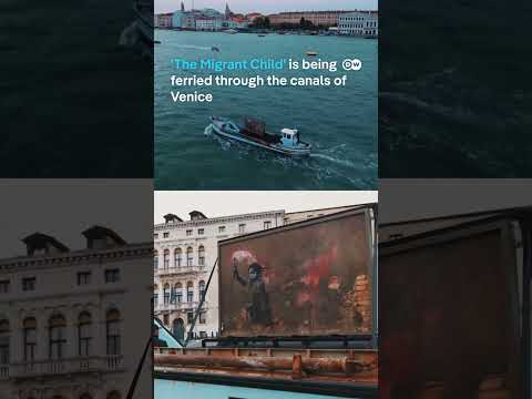 Restored Banksy artwork tours Venice canals | DW News