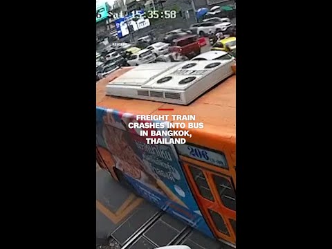 Freight train crashes into bus in Bangkok, Thailand