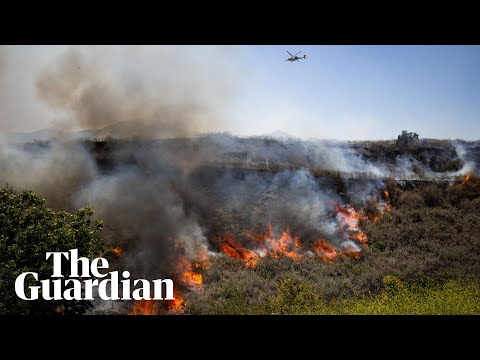 Aerial footage shows California brush fire spreading across Simi Valley