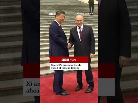 Xi and Putin shake hands before summit in Beijing. #BBCNews