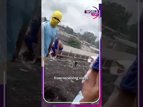 Inmates in Venezuela set mattresses on fire during a protest over alleged abuse by guards
