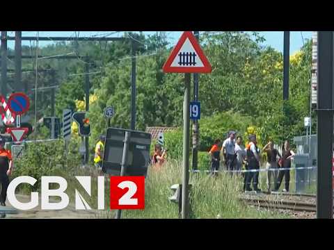 WATCH: Emergency workers at the scene where a school bus was struck in Belgium