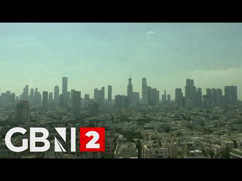 WATCH: Tel Aviv skyline after Israeli military says it struck targets in western and central Iran
