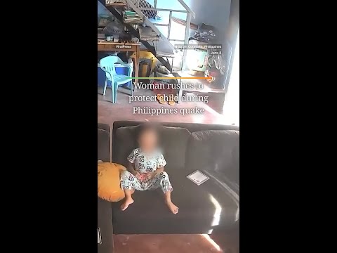 Woman rushes to protect child during