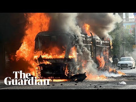 Bus set on fire as disorder flares up in Belfast
