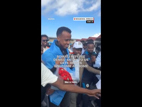 Somali referee denied entry to US gets hero’s welcome at home
