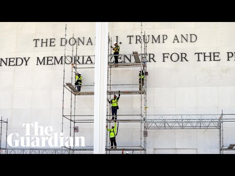Workers set up scaffolding outside Kennedy Center