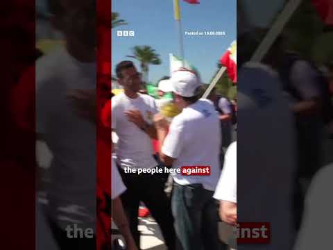 Iranian-Americans protest against Iran team at World Cup. #WorldCup #BBCNews
