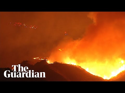 Night footage shows wildfires burning across California hills