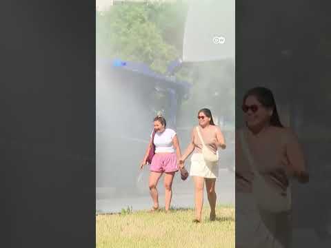 Berlin police deploy water cannon trucks during heat wave | DW News