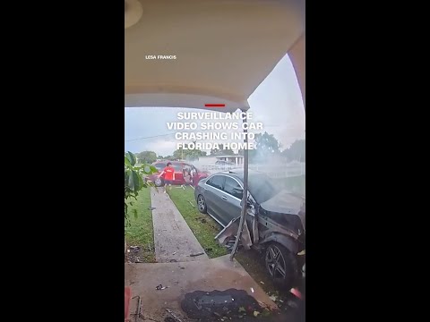 Surveillance video shows car crashing into Florida home