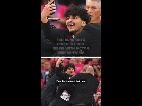 Fan runs onto court to take selfie with Victor Wembanyama during NBA Finals