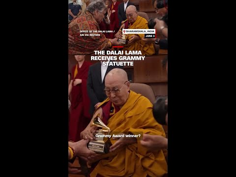 The Dalai Lama receives Grammy statuette