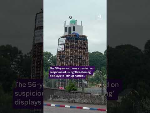 Man arrested after bonfire topped with mosque replica in Northern Ireland