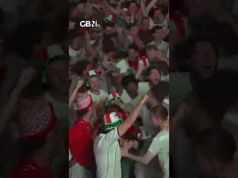 England fans react to Jude Bellingham’s equaliser against Norway in the World Cup quarter final