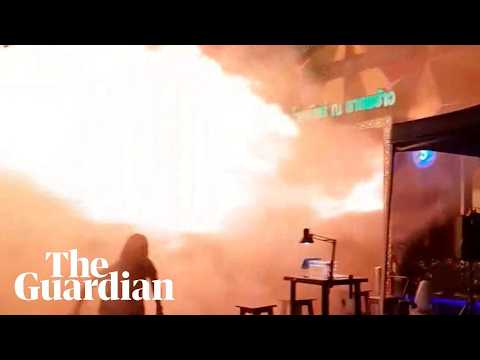People flee as flames erupt from Bangkok pub fire