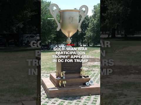 Gold ‘Iran war participation trophy’ appears in DC for Trump