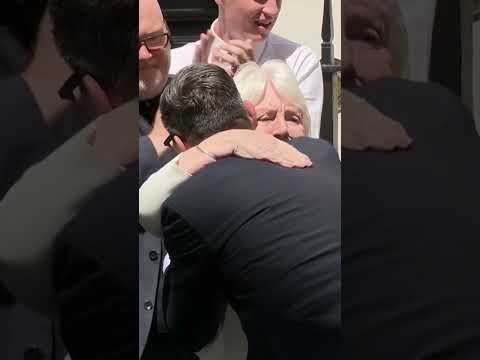 New PM’s long hug from his mum