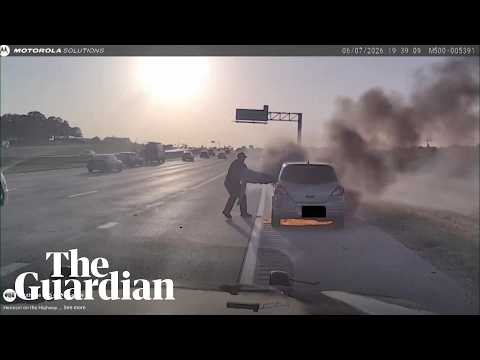 Footage shows Texas police officer rescuing man from burning car
