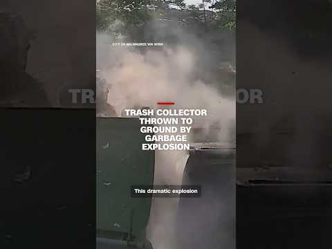 Trash collector thrown to ground by garbage explosion