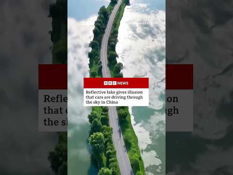 Reflective lake gives illusion that cars are driving through the sky in China. #BBCNews