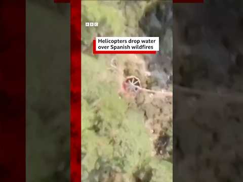 Helicopters drop water over Spanish wildfires. #BBCNews