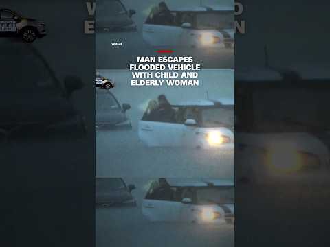 Man escapes flooded vehicle with child and elderly woman