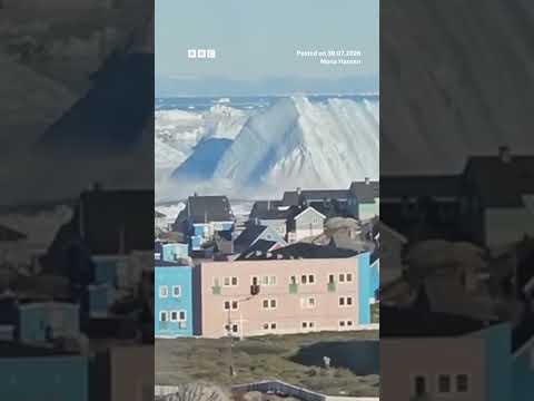 Huge iceberg turns over off the coast of Greenland. #BBCNews
