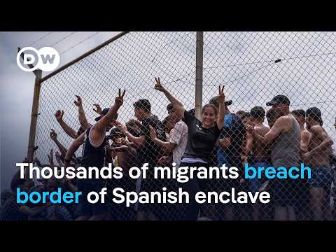 Migrants storm Ceuta to get into Europe | DW News