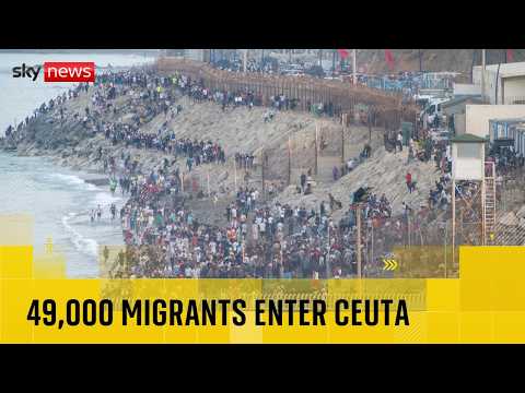 18 dead as almost 50,000 migrants enter Spanish enclave from Morocco