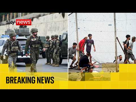 Thousands of migrants enter Spanish enclave from Morocco