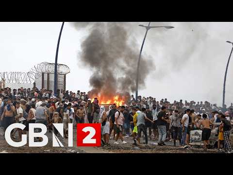 WATCH: Migrants storm Spanish border